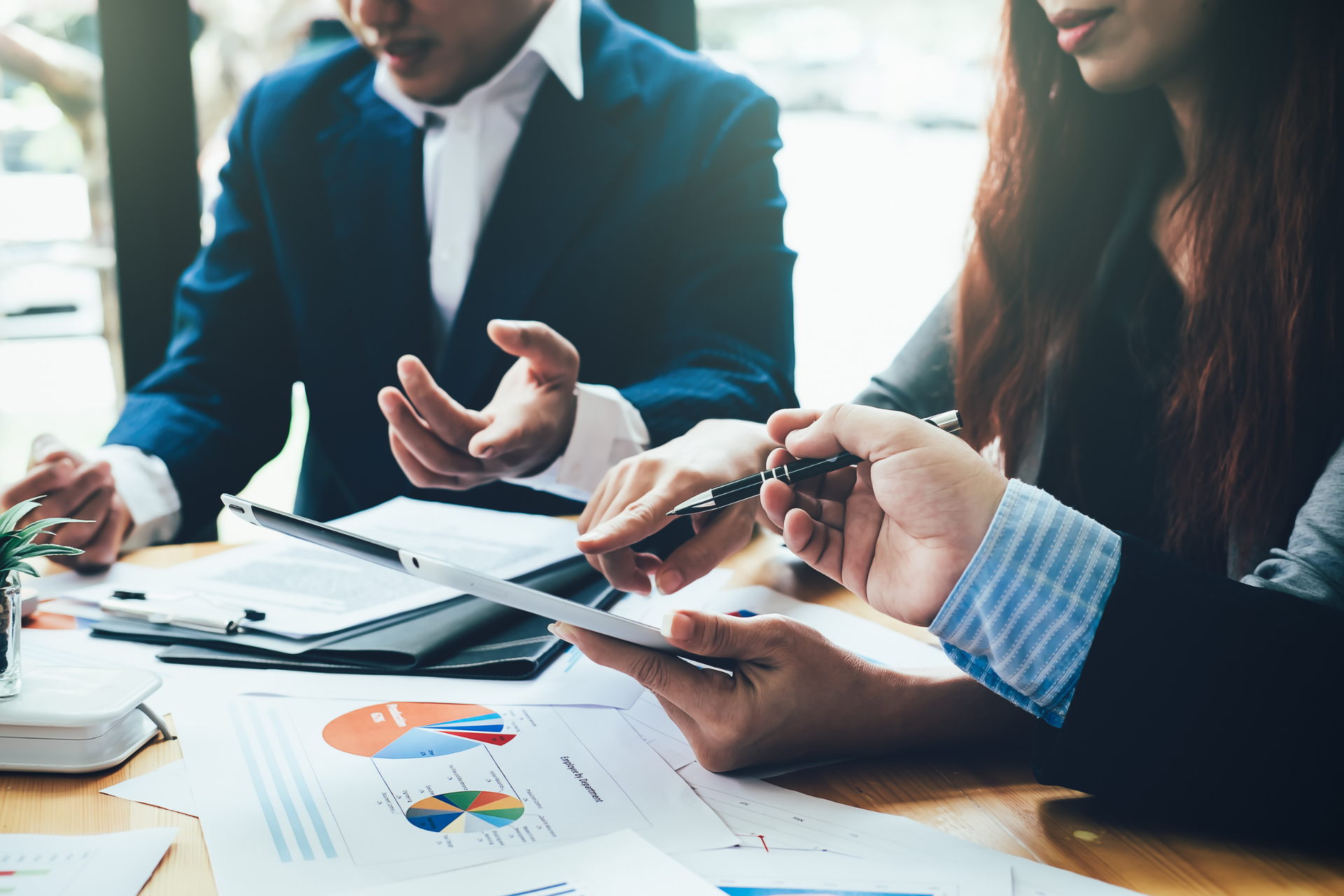 Business executives wearing suits in a strategy meeting